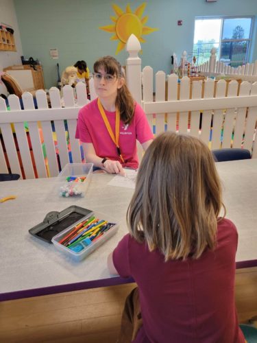 CORE Participant volunteering at a day care center