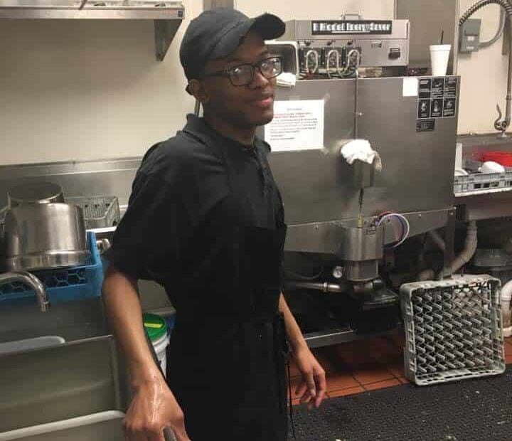 Damari working at a restaurant